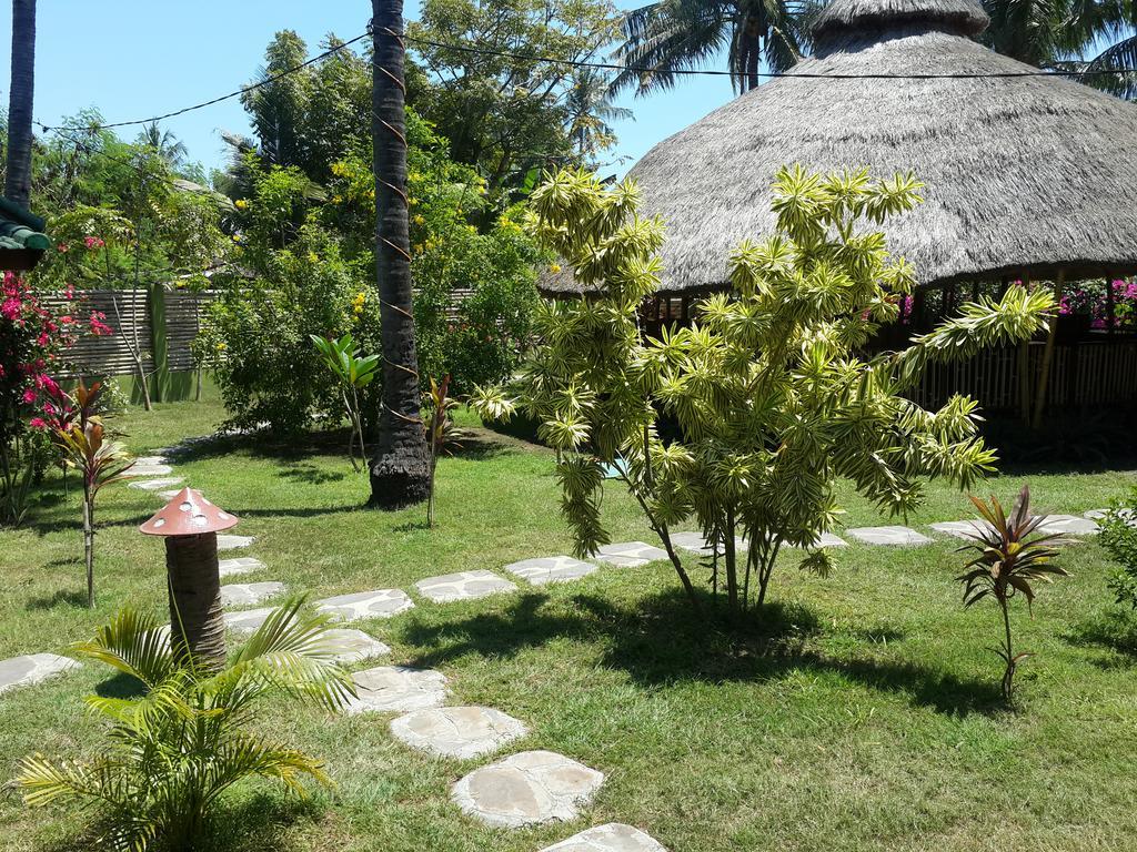 Oasi Bungalows Hotel Gili Air Exterior photo